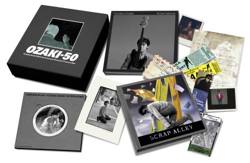 尾崎豊の生誕５０年記念プレミアムトレジャーＢＯＸ「ＯＺＡＫＩ・５０」のイメージ。トレジャーブック、写真集、インタビュー音声収録のＣＤ、オリジナルプリントの４点セット