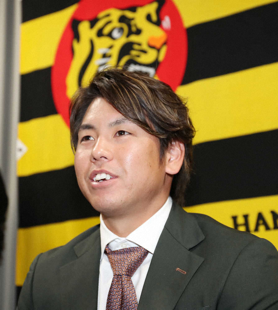 【画像・写真】阪神・梅野　5000万円増で年俸1億円到達「大台にいきました」