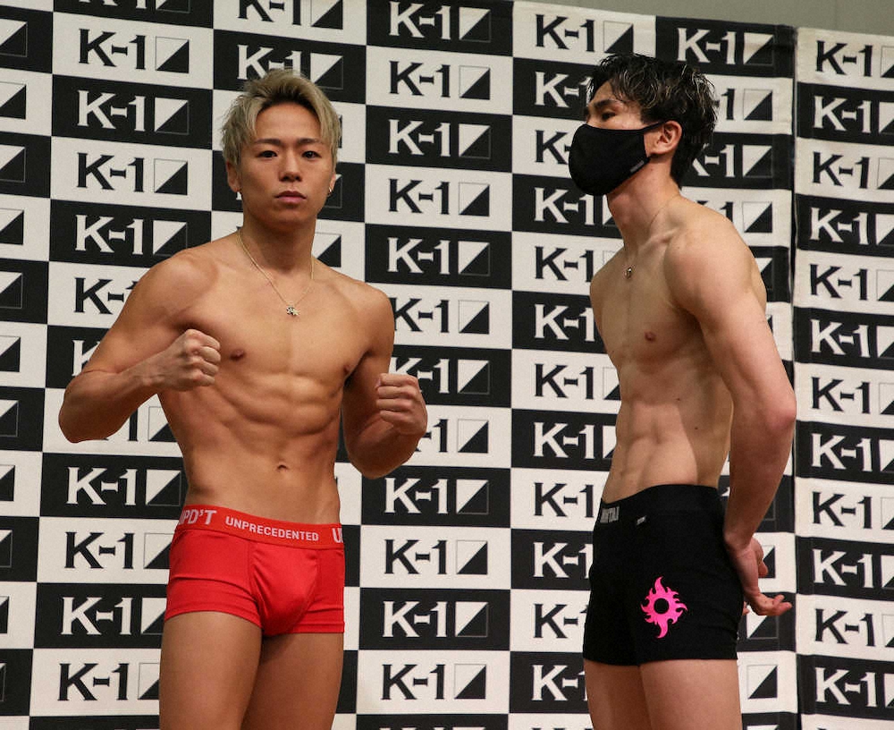 ＜K－1　WORLD　GP　2021　JAPAN前日計量＞スーパーフェザー級タイトルマッチで対戦する武尊（左）とレオナ・ペタス（撮影・佐久間　琴子）