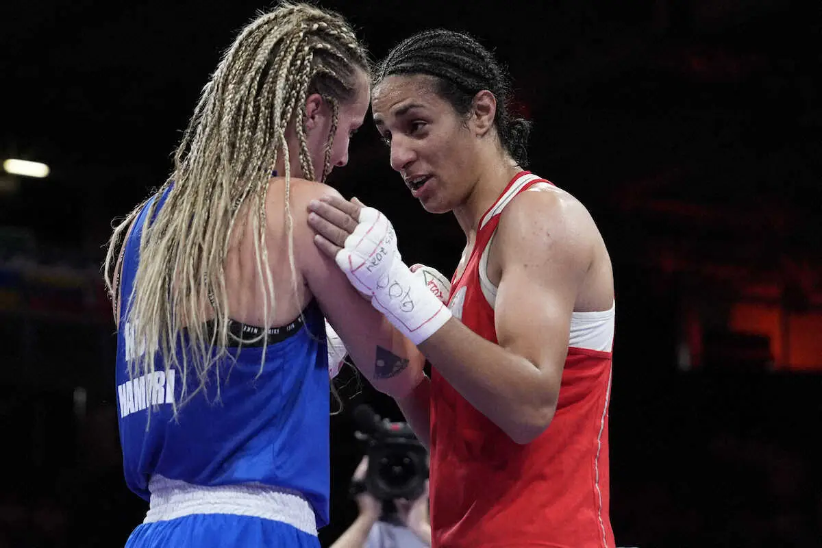 【画像・写真】健闘を称え合うヘリフ（右）とハモリ（AP）