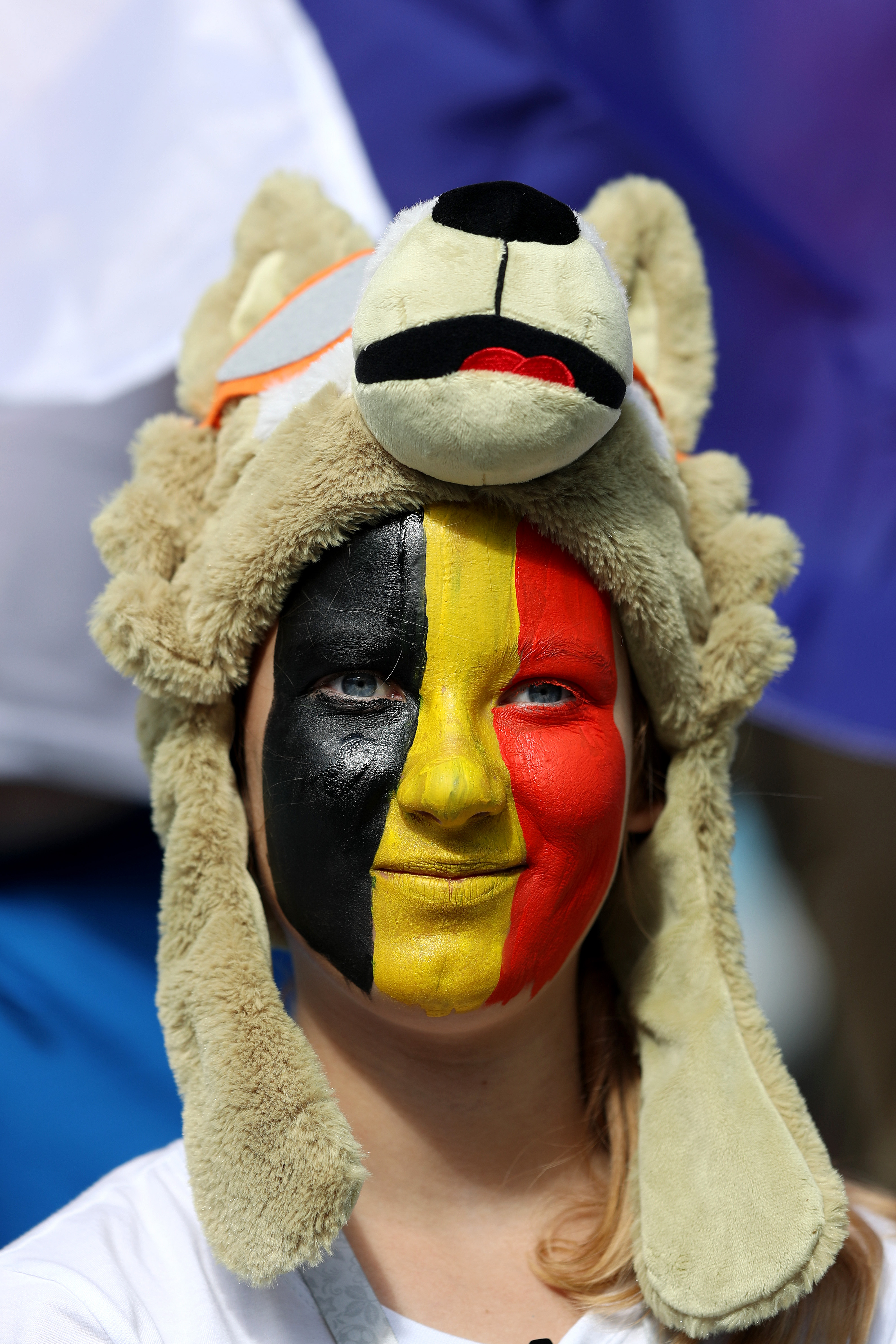 顔に国旗のペイントをして応援するベルギーのサポーター（ゲッティ）