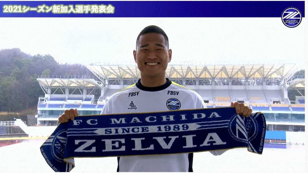 【画像・写真】スタジアムをバックに笑顔をみせる町田・鄭大世