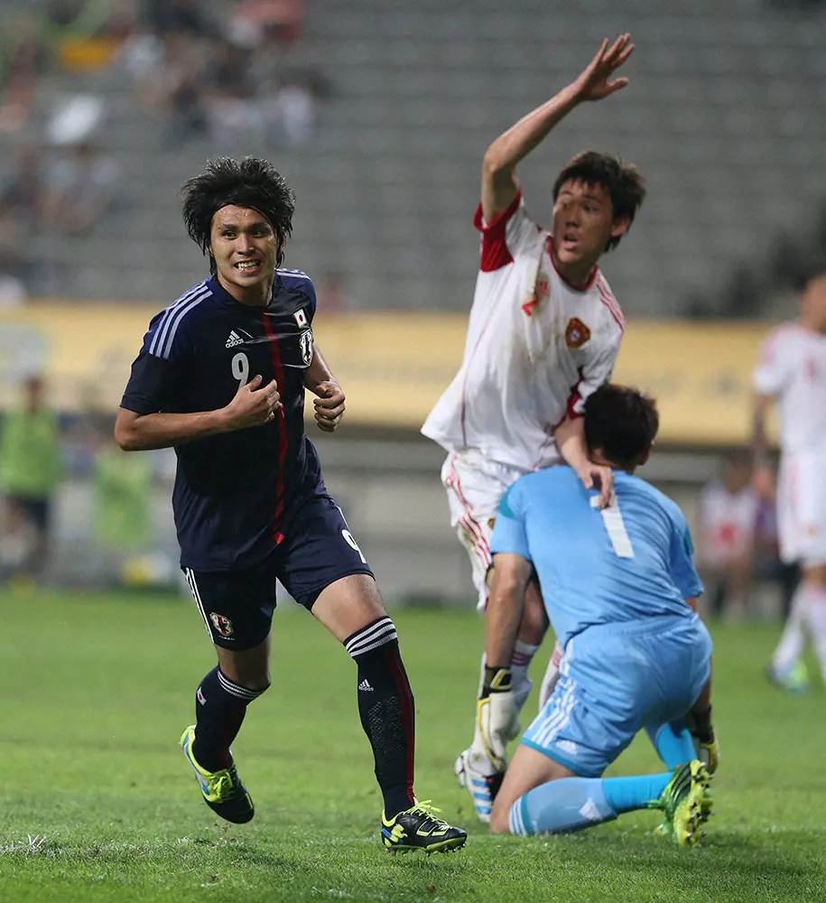 2013年7月21日、東アジア杯・中国の後半に代表初出場で初ゴールを決め、笑顔を見せる日本代表・工藤壮人さん
