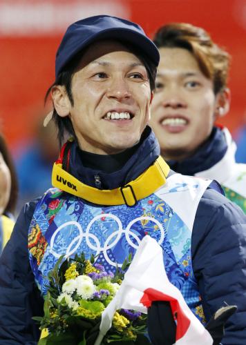ジャンプ団体で銅メダルを獲得し、笑顔の葛西
