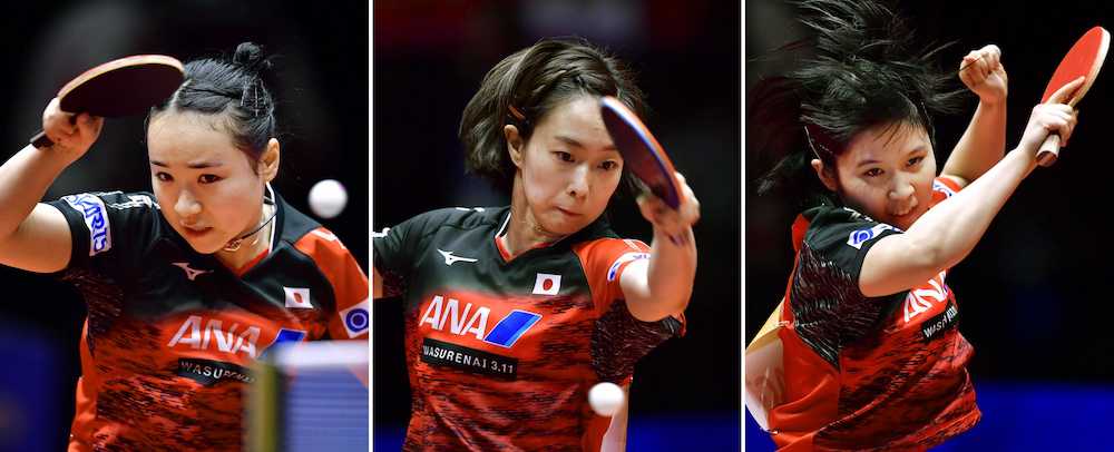 卓球の世界選手権団体戦女子準々決勝でプレーする（左から）伊藤美誠、石川佳純、平野美宇（共同）