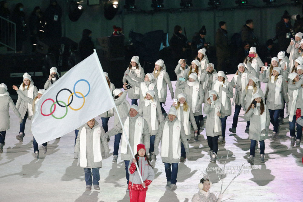 18年の平昌冬季五輪の開会式で五輪旗を先頭に行進するOAR（ロシアからの五輪選手）の選手団