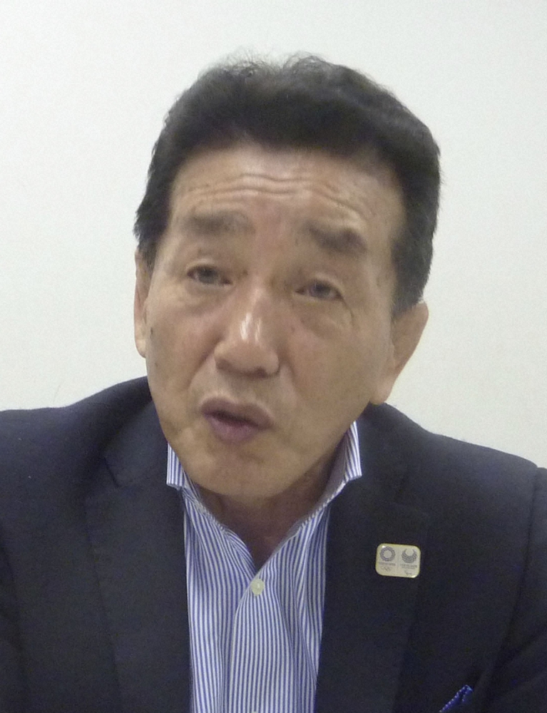 インタビューに応じる日本レスリング協会専務理事の高田裕司氏