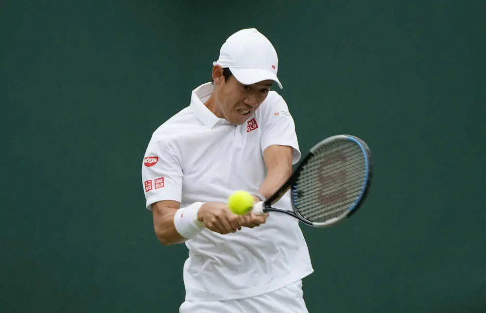 【画像・写真】男子シングルス1回戦でプレーする錦織圭（AP）