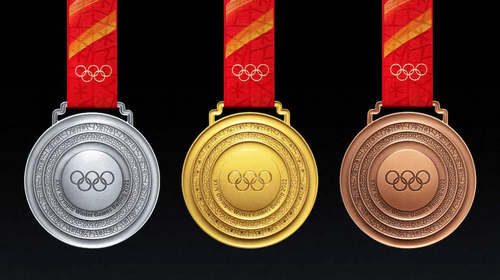 26日、発表された北京冬季五輪のメダルのデザイン（新華社＝共同）